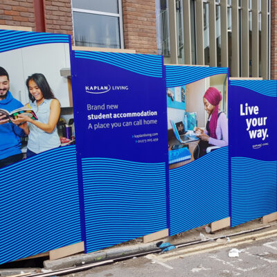 Education centre renovation hoarding in Brighton, highlighting benefits to the local community and information to reach out.