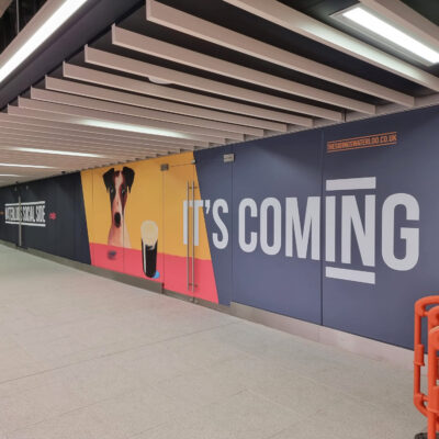 Vibrant property hoarding featuring eye-catching graphics